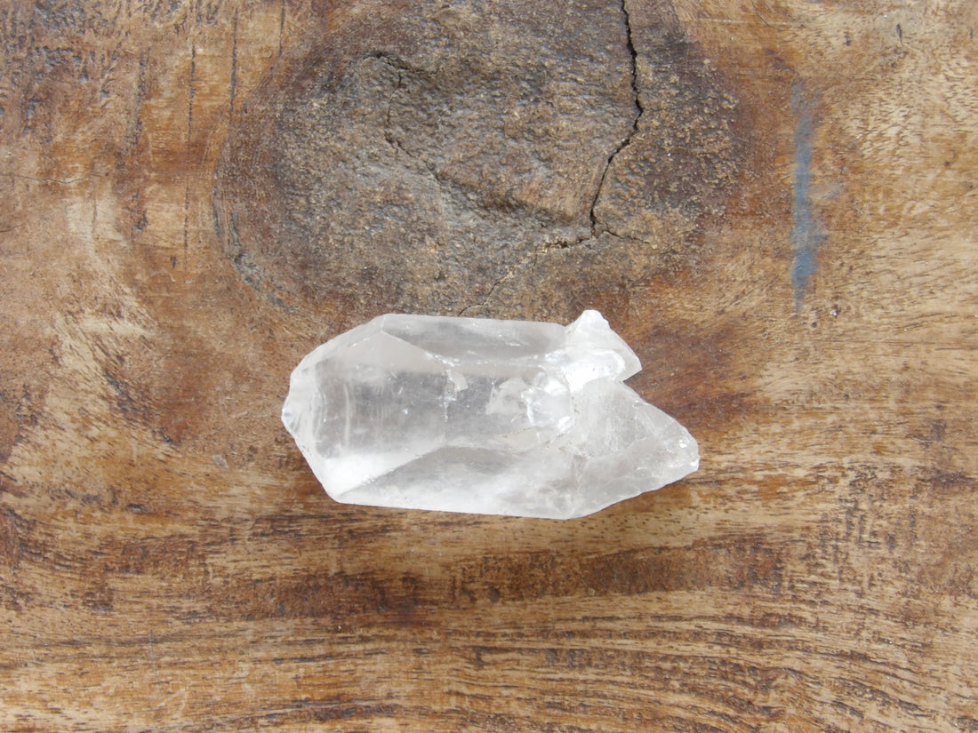 Natural clear quartz point - self healed