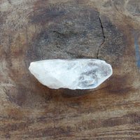 Tabular crystal on wooden table