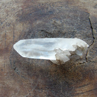 Natural clear quartz point - self healed