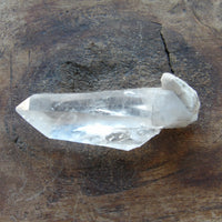 Natural clear quartz with milky bottom - self healed