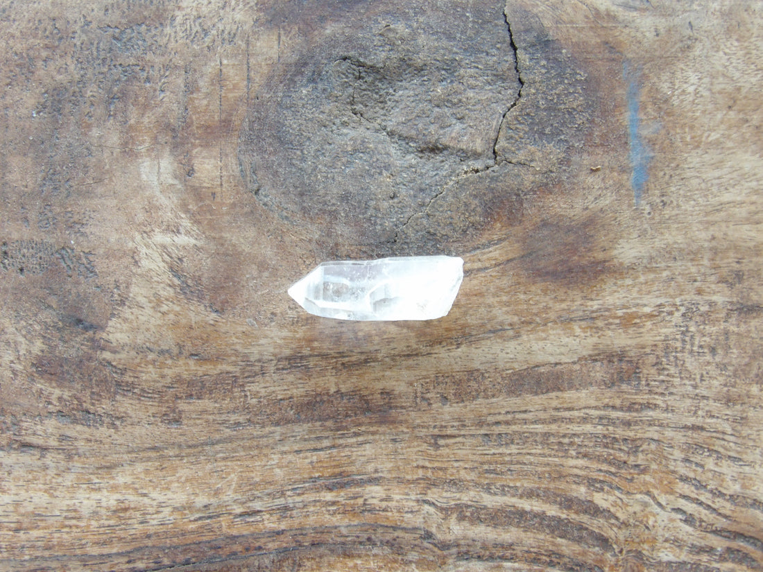 Raw clear quartz point with Sedona charge Series 4