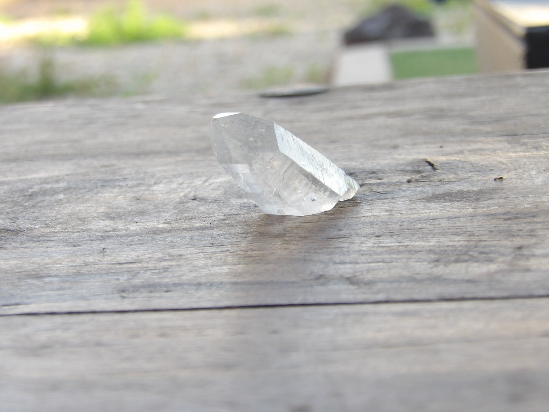 Clear quartz point with natural facets Series 4 - standing
