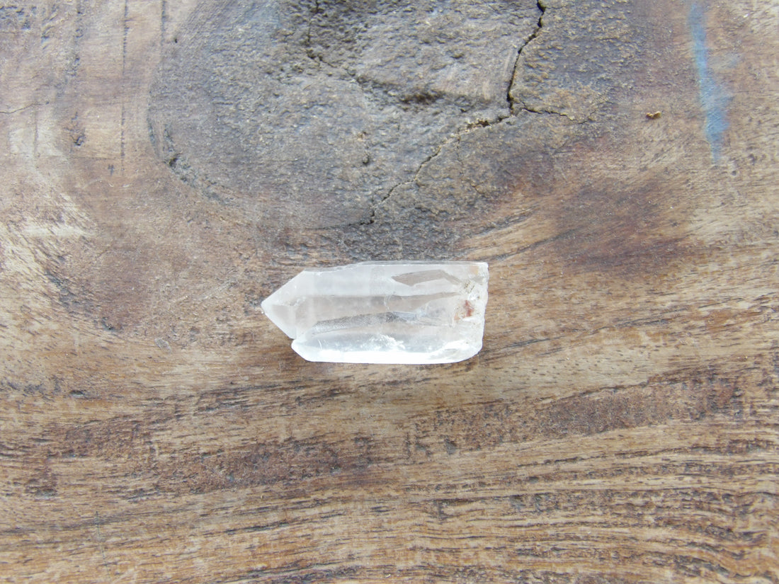 Clear quartz point Sedona charged crystal detail - twin formation with inclusion