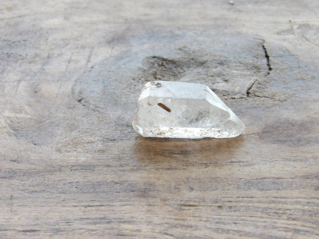 Clear quartz crystal point natural inclusion