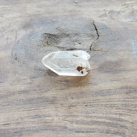 Clear quartz crystal point natural earth grown
