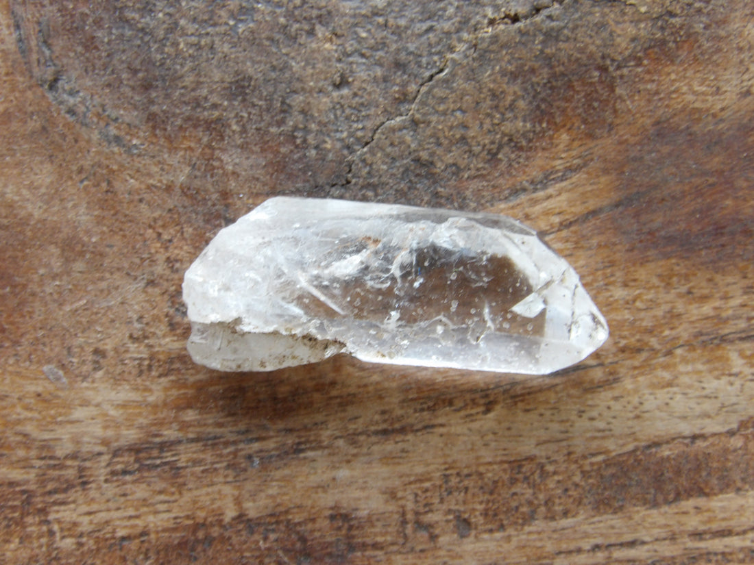 Clear quartz crystal point natural earth grown