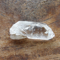 Clear quartz crystal point natural earth grown