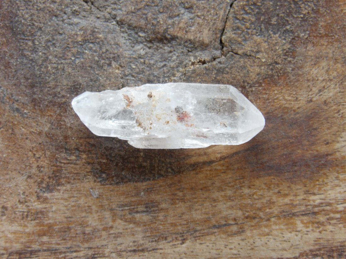 Clear quartz crystal point natural earth grown- natural inclusion