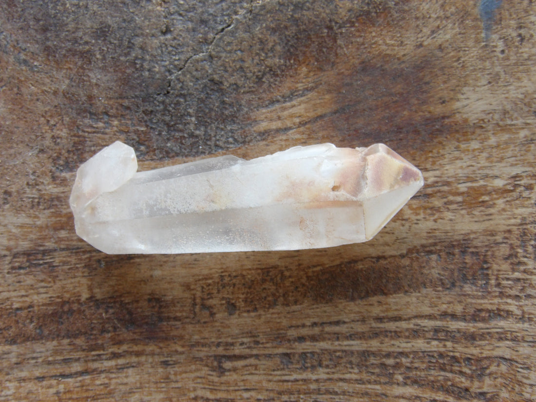 Clear quartz crystal point natural raw stone