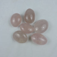 polished pink quartz palm