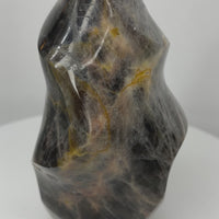 Black Moonstone Flame with silver flash and golden mineral veining