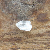 Tiny Sedona Charged Clear Quartz point 